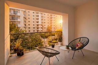 Charming Modern 1BR Apartment with Balcony Views - 0