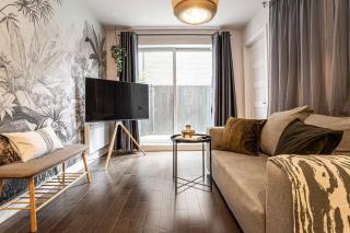 Sleek Modern 2BR Getaway with Gym & Rooftop Views Near Downtown & Airport - 4