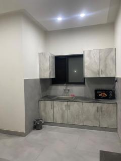 Modern 1BHK Apartment with Kitchen and Dining Area - 0