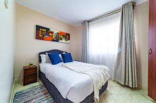 Cozy parlor JKIA,SGR minutes away with Wifi,washer, serene views - 1