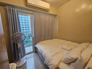 Amenity Pool View 1 BR balcony MOA SMX Ikea Shore002 - 1