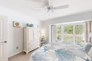 Condo 2-story with on-site pool, private patio, & W/D - near beach/golf - 1