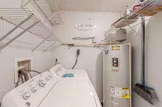 Dog-friendly home with fenced yard, patio, grill, & park across the street - 1