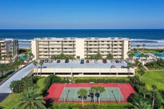 Oceanfront condo with beach access, patio, outdoor pools, tennis court, W/D, AC - 0