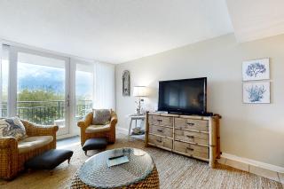 Renovated condo with balcony, lush views, outdoor pool - 3