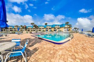 Island-themed living with furnished patio, shared pool & beach access - 6