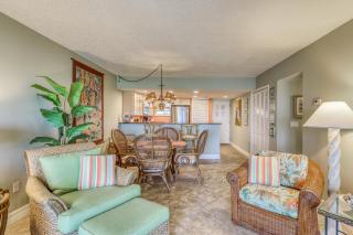 Island-themed living with furnished patio, shared pool & beach access - 1