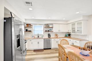 Updated home across from beach with covered balcony, central AC, & washer/dryer - 1