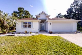 The Barefoot Bungalow | House in Palm Coast with an enclosed pool & grill - 0