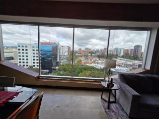 Spacious high Rise Condo w cover Garage zona 13 - 1