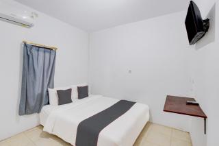 Hotel O Airport Guesthouse - 9