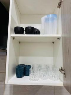 Amberwood Haven 1BHK Apartment with Balcony & City Views - 7