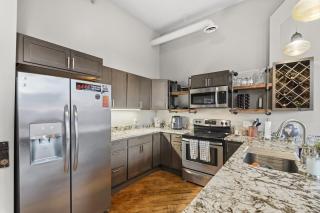 Industrial Loft with Exclusive Speakeasy Access - 9