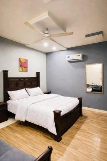 Global properties 1BR In Faisalabad Ideal for families - 0