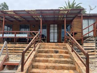 Cabaña familiar frente al mar 12p - 4