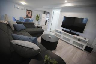 Warm and Welcoming Basement - 1