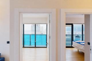 Orbi City Beachside Apartment - 9