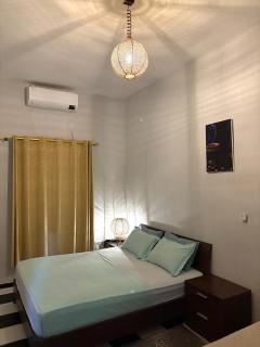 Spacious Apartment with Motorcycle Garage, Free Parking, and Air Conditioning - 8