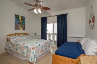 Tiki 216 - 2BR Condo with Balcony Steps from Beach condo - 1