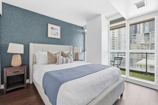 Modern Downtown Retreat Cozy Living & City Views - 9