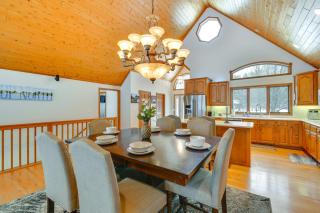 Lakefront Gladwin Home with Private Beach and Hot Tub - 4