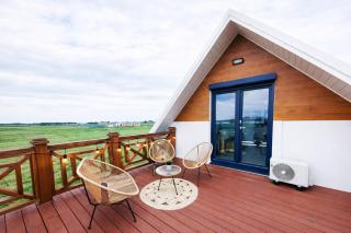 Domek NIVA z Jacuzzi i Widokiem na Zalew - 2