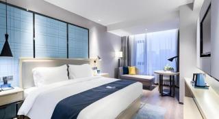 Echarm Hotel Huzhou Wuyue Plaza Children's Clothing City - 8