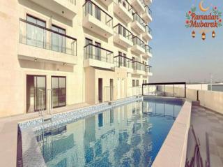 Luxury Apartment with Pool Gym & Free Parking at Equiti Gates Jebel Ali - 9