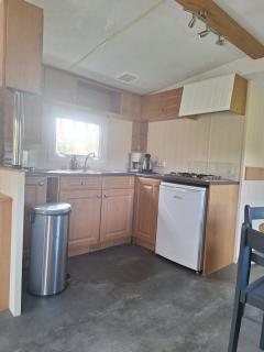 Gezellige Stacaravan nr 7 op Mini-Camping Klaproosje 4 personen - 6