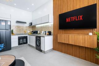 Boho Beige Apartment - Walkable to Beach with Workspace, Fast WiFi, AC & Full Kitchen - 6