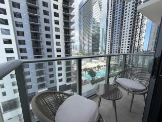 Downtown Condo Near Attractions with Pool and Gym - 1