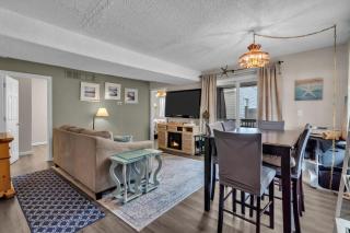 Relaxed Shore Getaway with Porch Seating 3BR with Sofa Bed Parking Included - 3