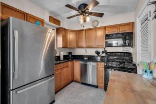 Relaxed Shore Getaway with Porch Seating 3BR with Sofa Bed Parking Included - 2