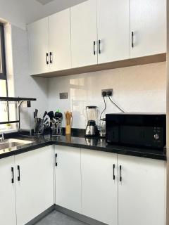 The comfort executive loft three bedroom apartment with amazing breathtaking city views , swimming pool ,gym ,private ample parking space with designated child playground area - 9