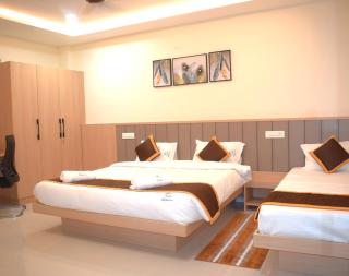 Relax Inn Suites & Rooms - 1