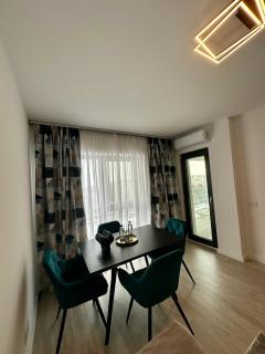 Modern 1BR Apartment with Terrace and City View near Romexpo - 3