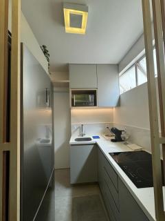 Estadia Elegante 1Q Amplo na Asa Norte com Cozinha Completa, Varanda com Churrasqueira e Vista pra Cidade - 2