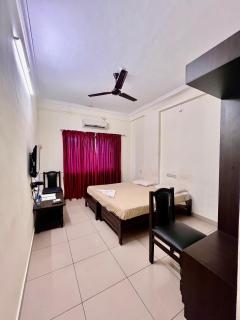 Hotel Downtown Lodge Manipal - 0