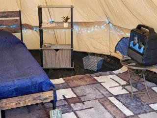 Cozy Bell Tent Glamping on Private Fenced Deck with Bathhouse Firepit WiFi and Trails in Mio, Michigan - 5