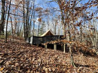 Cozy Bell Tent Glamping on Private Fenced Deck with Bathhouse Firepit WiFi and Trails in Mio, Michigan - 0