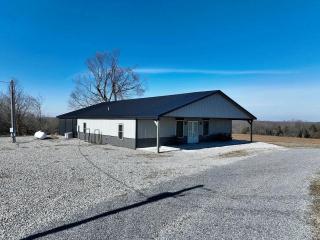 Cozy Wood-Interior Lodge with Screened Patio, Fire-Pit Table, Grill & Fast WiFi in Goreville, Illinois - 0
