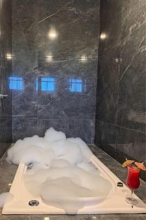 Flat em condomínio com Jacuzzi,Churrasqueira e Estacionamento - 1