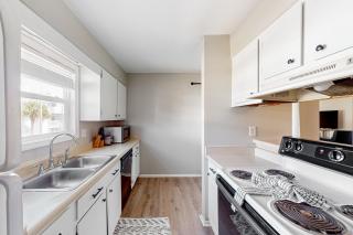 Sound-Side Condo with Grill Deck & W&D and Shared Pool - 1