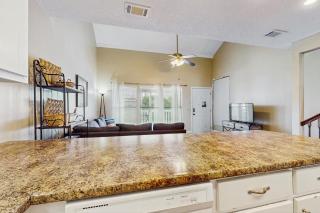 Cozy coastal condo with a loft shared pool and beach access - 3
