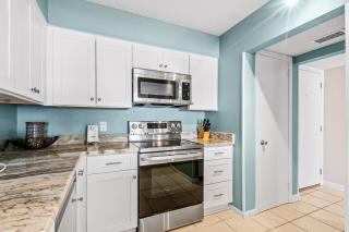 Gulf and beachfront condo with furnished patio outdoor pool gym & tennis - 1
