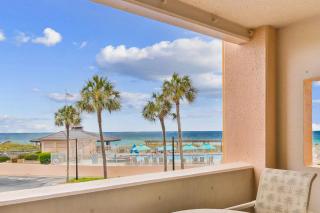 Bright ocean-view condo with community pool and direct beach walkway - 9