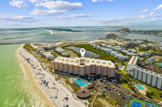 Bright ocean-view condo with community pool and direct beach walkway - 6