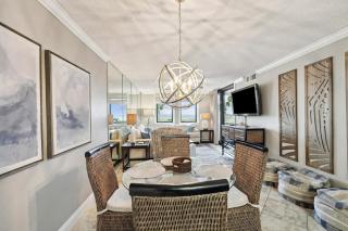 Bright ocean-view condo with community pool and direct beach walkway - 2