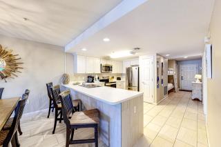 Updated 1st-floor condo with large private balcony pool grills firepit & gym - 4