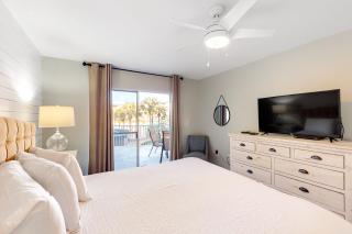 Updated 1st-floor condo with large private balcony pool grills firepit & gym - 1